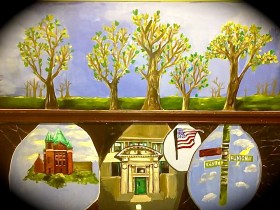 10 feet by 7 feet. Acrylic on plaster wall. Entirely student dreamed, created and crafted! The "roots" are scenes from the neighborhood- this depicts how our building is "rooted" in the community and how important it is to allow it to remain open so it can continue to "grow great leaders". 
